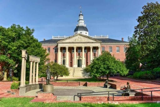 Maryland State Capital building in Annapolis history on summer afternoon.