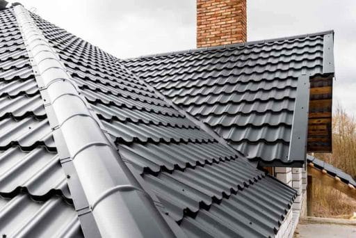 view of roof with one of the cheapest roofing materials, metal shingles