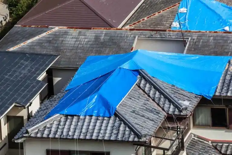 How To Tarp A Roof After Storm Damage (7 Simple Steps)