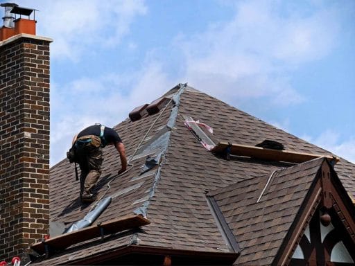 best time to replace roof worker